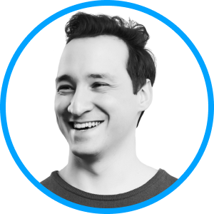 A headshot picture of Waldi with a bright blue border around it.